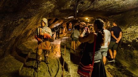 Wieliczka corridor with miners and tourists